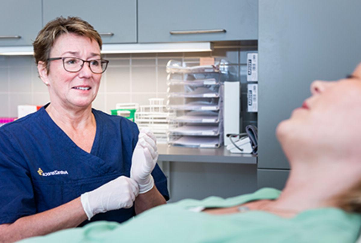 Nurse examining a patient